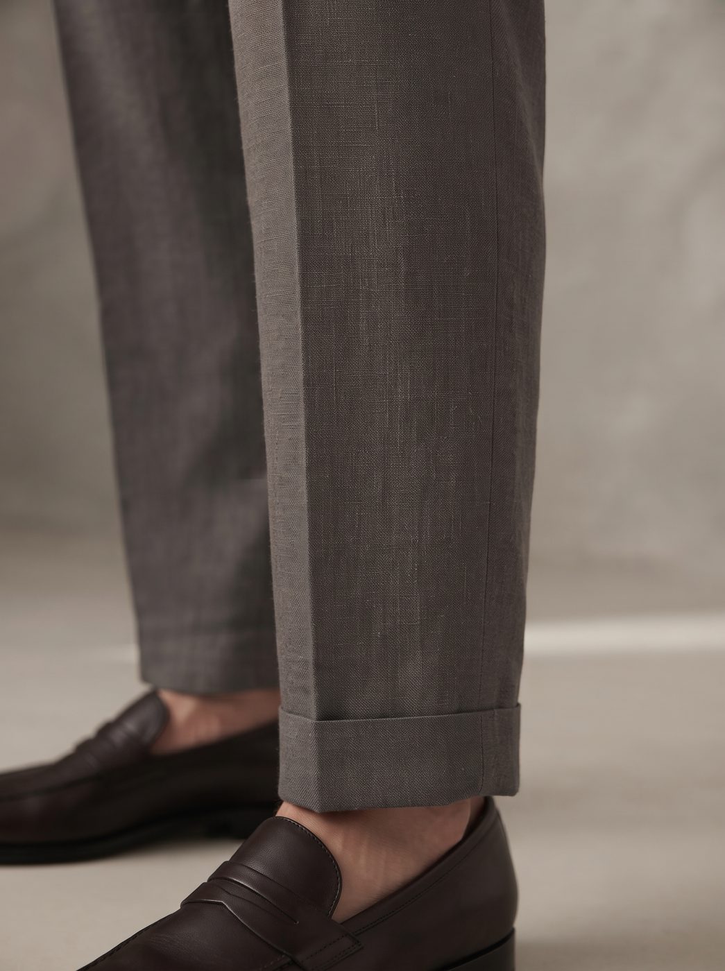Charcoal Pleated Linen Trouser, hem view in Charcoal