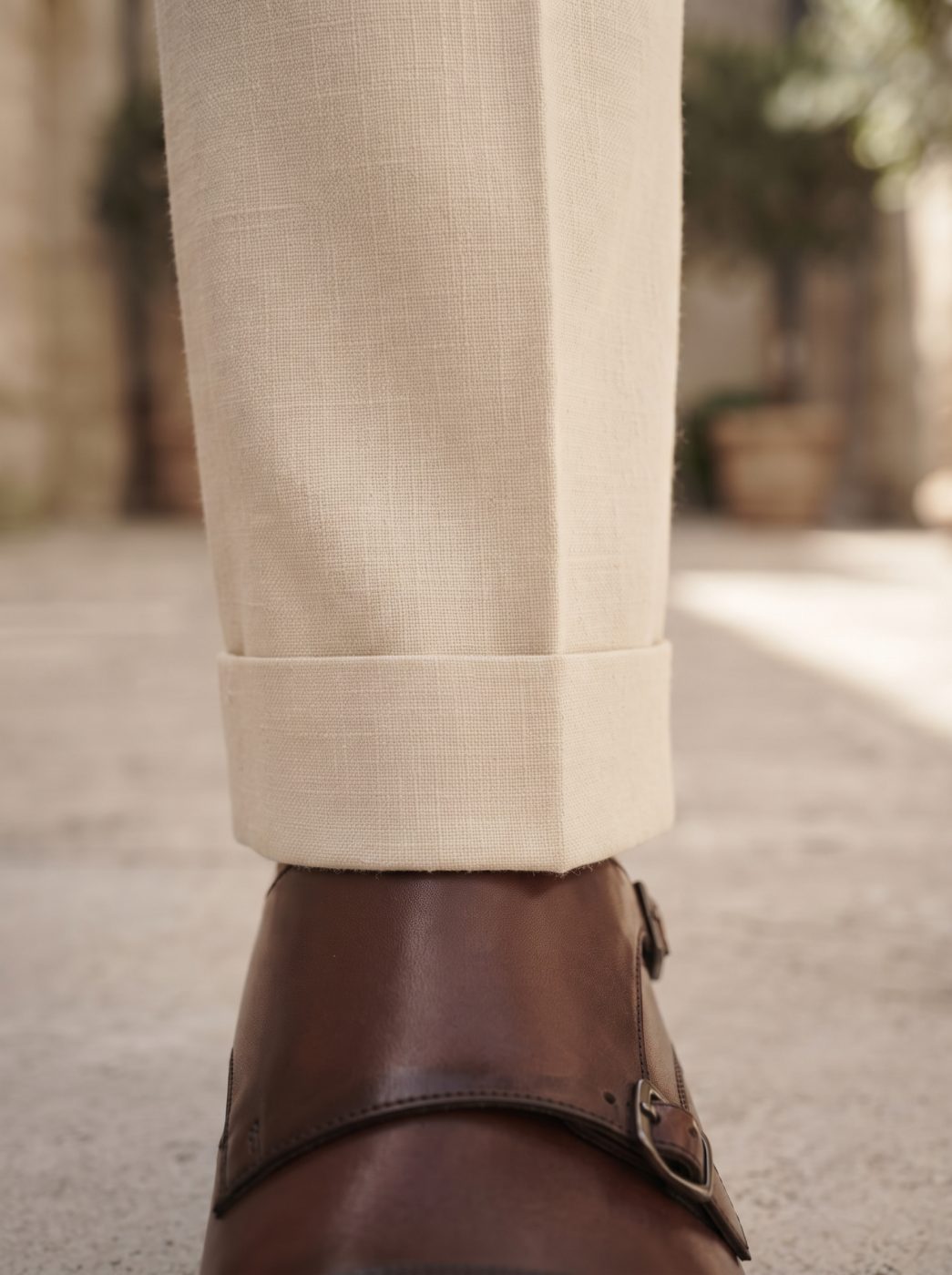 Riviera Side-Buckle Tailored Trouser, Cream, hem view in Cream
